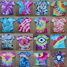 tie - dyed shirts laid out on the ground