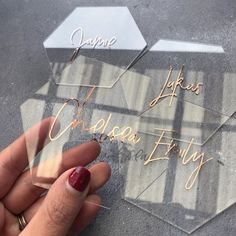 someone is holding some type of acrylic that they are using to make their own name tags