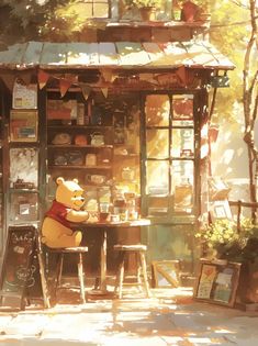 a winnie the pooh character sitting at a table in front of a small store