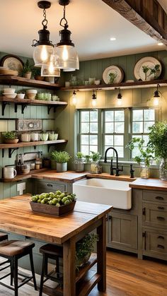 a kitchen filled with lots of counter top space and wooden shelves next to a sink