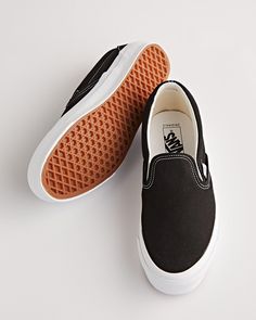 Vault by Vans is the brand's premium line. The Vans UA OG Classic Slip-On in black is a reiteration of a classic silhouette, recognisable by its contrast heel tab. Vans Vault Slip On, Vans Slip On, Shoe Store, Black Canvas, Classic Silhouette, Vans Classic Slip On Sneaker, Slip Ons, Southern California