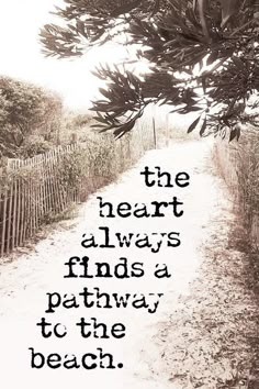 an image of a path with the words, the heart always finds pathway to the beach