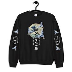 The Great Wave Off Kanagawa Sweatshirt, Japanese , Aesthetic, Aesthetic Clothing, Japanese sweatshirt, Japan, Tumblr Clothing, Japanese crane A sturdy and warm sweatshirt bound to keep you warm in the colder months. A pre-shrunk, classic fit sweater that's made with air-jet spun yarn for a soft feel and reduced pilling. * 50% cotton, 50% polyester * Pre-shrunk * Classic fit with no center crease * 1x1 athletic rib knit collar with spandex * Air-jet spun yarn with a soft feel and reduced pilling Japanese Hoodie, Japanese Crane, Japanese Tshirt, Anime Streetwear, The Great Wave, Anime Sweatshirt, Great Wave Off Kanagawa, Adventure Style, Japanese Aesthetic