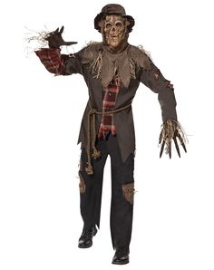 a man in a scare costume holding his hands up