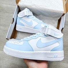 Elevate your sneaker game with our Custom Air Force 1 Baby Blue! Designed to stand out, these shoes exude confidence and adventure. Handcrafted with a bold touch, these kicks are perfect for risk-takers looking to make a statement. Step into style while taking on any challenge in these custom sneakers. 🔥 100% genuine, Brand New. 👟 Custom sneakers. 💫 Every pair is hand-made to order. ✨ Best quality waterproof and scratch-proof paints used.✨ 1000+ satisfied customers across various platforms. ? Badass Girl, Casual Shoes Women Sneakers, Nike Shoes Women Fashion, Nike Kicks, Nike Shoes Air Force, Nike Fashion Shoes, Preppy Shoes, Pretty Shoes Sneakers, Air Force 1 Mid