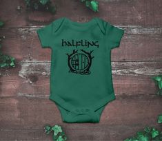 a baby bodysuit with the word balfing printed on it's chest