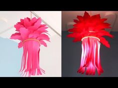 two different types of red and pink lights hanging from the ceiling, one is made out of paper