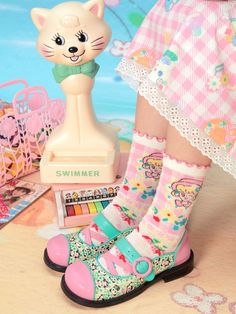 The price includes two pairs of socks, one blue and one pink. Pink Sweet Socks For Spring, Cute Ruffled Socks For Spring, Pink Ruffled Socks For Spring, Playful Pink Summer Socks, Cute Pink Ruffled Socks, Pink Socks For Spring, Cute Blue Spring Socks, Cute Pink Spring Socks, Pink Striped Shirt