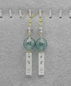 A minimal earring design inspired by traditional Japanese wind chimes from the Edo period. Made with hollow, hand-blown glass beads and Tassel 14k gold plated accessories.Transparent glass represents purity, and gold tassels represent enthusiasm, adding unique temperament to the wearer . Lightweight and comfortable for all day wear. Dimension: length: 4 inches approx . 10cm Glass Bead diameter: 0.8inches approx. 2cm Packaging: All jewelry comes in a beautiful and careful packaging If the item is Chime Earrings, Japanese Jewelry, Jewelry Styling, Edo Period, Valentines Day Weddings, Wind Chime, Day Wedding, Glass Earrings