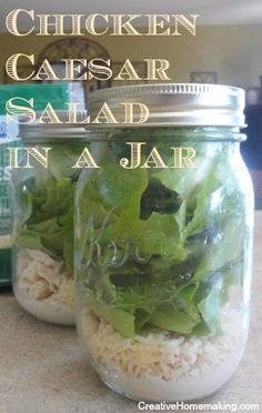 two mason jars filled with salad in a jar