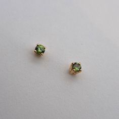 Green Sapphire (Natural) Micro Stud Earrings In Solid, 14 Karat Yellow Gold They're Cute And Tiny But Very Sparkly! 2.5mm Green Sapphires Set In 14k Solid Gold Four-Prong Stud Earring Settings. Dainty, Professional And Great For A Second-Piercing Or All On Their Own! Perfectly Rounded Prongs And Set With Care. Note: Their Hue Appears More "Olive" In Person. They Appear Larger In Photos. Earring Gift Box Included With Your Purchase! Green Stud Earrings Gold, Gem Stud Earrings, Emerald Studs, Second Piercing, Ginger Hair Color, Sparkly Jewelry, Earring Gift, Green Gems, Green Sapphire