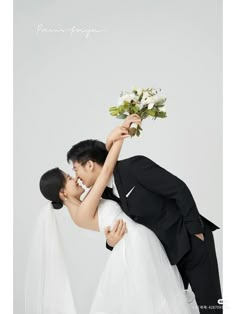 a bride and groom kissing each other in front of a white background with the words, i love you