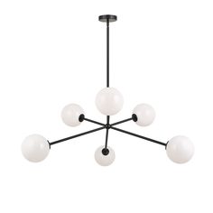 a black and white chandelier with five glass balls