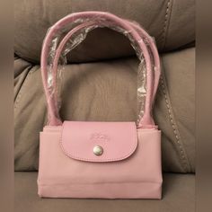 New Pink Exterior, White Interior, Versatile Series. Waterproof And Stain-Resistant. 100% Brand New, Size: Medium Pink Longchamp Bag Outfit, Pink Longchamp Bag, Longchamp Bag Outfit, Blame Canada, Ur Cute, Pink Tote Bag, Longchamp Bag, Longchamp Bags, Bags Pink