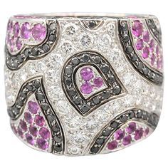 Fine pink sapphire, black and white diamond ring set in 18k white gold, by De Grisogono. It features high grade round pink sapphires and black/white round cut diamonds in an abstract design. Size 6.5. Hallmarks: De Grisogono, 750, maker's mark, French 18k gold assay mark, reference numbers. Grisogono Jewelry, Diamond Ring Set, White Diamond Ring, Diamond Ring Settings, 18k Yellow Gold Ring, Domed Ring, White Gold Ring, Round Cut Diamond, Pink Sapphire