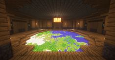 an empty room with a map on the floor