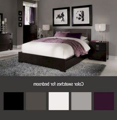 a bedroom with gray walls and purple accents