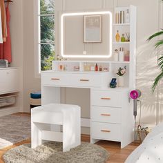 a white vanity with lighted mirror and stool