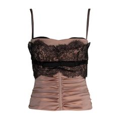 Probably from the iconic 2001 Spring-Summer collection, this Dolce & Gabbana corset bustier top will for sure enhance your femininity ! Made from glossy powder pink satin, it's designed with boning to offer structure and shape. Softly gathered throughout, this couture-inspired top is embellished with black lace and matching black satin bow. Black bra bustier detail and adjustable straps. The bra fastens with hooks and eye and the corset with a zip at the back. Labeled an Italian size 42 (US 6), Dolce Gabbana Gothic, Giovanna Battaglia Engelbert, Corset Bustier Top, Vintage Bustier, Top Bustier, Giovanna Battaglia, Satin Noir, Floral Corset, Corset Bustier