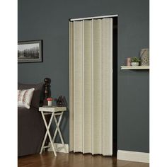 the sliding door is open and ready to be used as a room divider or screen