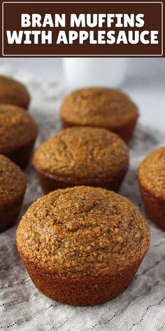 muffins with applesauce are sitting on a table