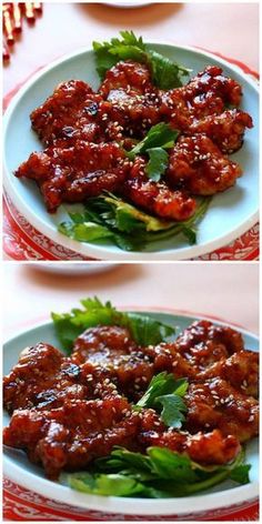 two plates filled with meat covered in sauce and garnished with green leafy greens