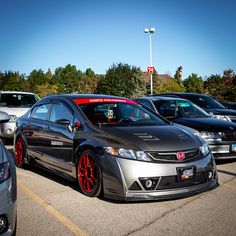 several cars are parked in a parking lot