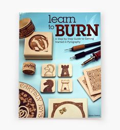 the cover of learn to burn book with wooden stamps and inking tools on it