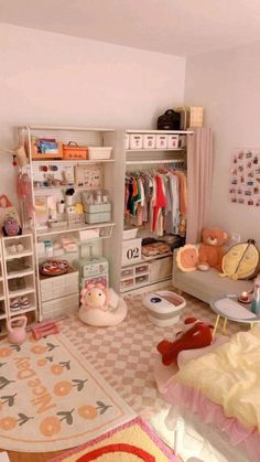 a child's bedroom with lots of toys on the floor and furniture in it