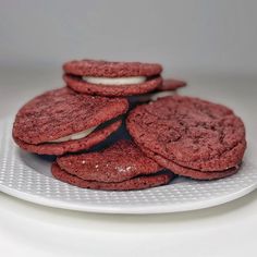 red velvet sandwich cookies on a white plate