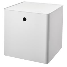 a white box with a black hole in the front and bottom part is shown on a white background