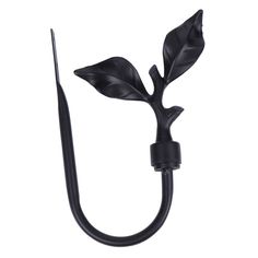 a black hook with a leaf on it