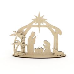 a wooden nativity scene with the birth of jesus