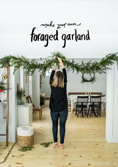 a woman is holding up a sign that says, make your own forgeted garland