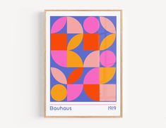 a framed poster with an abstract design in pink, orange and blue on the wall