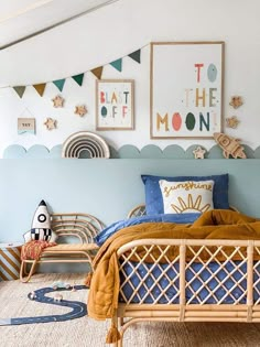 a bed room with a neatly made bed and some decorations on the wall above it