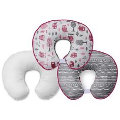 three pieces of white and pink baby pillow with owls on them, one in the shape of an elephant