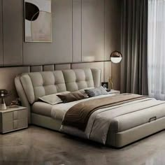 a bedroom with a large bed and two nightstands on either side of the bed