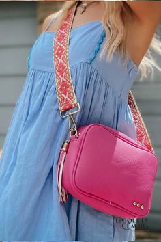 Bring out the fashionista in you with the Willow Hot Pink Camera Crossbody Bag! With its vibrant pink color, this bag is sure to make a statement no matter where you go. It’s perfect for any chic woman looking to express her style with modern flair. Crafted from luxuriously soft vegan leather, and fun tassel, the zippered top and linen beige interior with a zippered stash pocket on the inside make it convenient to access all your personal items. It comes with a trendy and fun canvas strap and sh Pink Camera, Beige Interior, Glam Girl, Zipper Top, Trendy Accessories, Everyday Bag, Chic Woman, Pink Bag, Leather Crossbody Bag