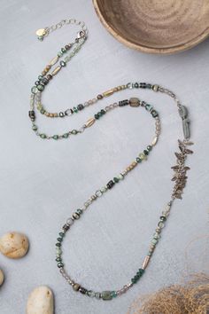 Inspired by the breathtaking beauty of Venice our Venetian Dreams collection features tranquil and ethereal tones of blue. Antique Silver Plated Brass (lead and nickel free) Czech Glass, Abalone, Fluorite, Freshwater Pearl 37-39", adjustable with antique silver plated brass lobster claw clasp We hand select our natural materials, thus there may be slight variations in color and/or size that will not detract from the overall aesthetic Our unique handcrafted designer jewelry for women is made in A Pearl Necklace Designs Unique, Shell Collage, Ethereal Jewelry, Silver Gold Earrings, Silver Gold Necklace, Abalone Necklace, Blue Antique, Tones Of Blue, Roman Glass