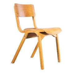 a wooden chair that is sitting up against a white background with the seat folded down