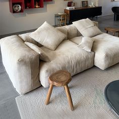 a living room filled with furniture and decor