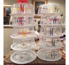 there are many plastic containers stacked on top of each other with the letters m and w