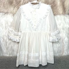 Vintage Genway California White Lace Dress. In Excellent Condition. Size 5. Has Beautiful Lace Trim On Sleeves, Skirt, Neckline And Bodice. Sleeves Are Sheer. Bodice And Skirt Are Fully Lined. Button Opening On Backside Has Faux Button Detail On Bodice With Bow On Neckline. This Dress Is A Vintage Dreams Perfect For A Prairie Photoshoot Or Special Event. Prairie Photoshoot, White Lace Dress, Lace White Dress, Button Detail, Vintage Children, Kids' Dresses, Special Event, White Vintage, White Lace