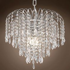 a crystal chandelier hanging from the ceiling