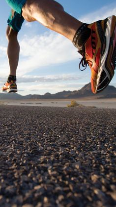 a person jumping in the air with their shoes on