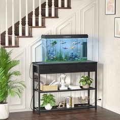 a fish tank sitting on top of a shelf next to a stair case in a house