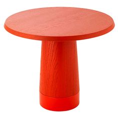 an orange wooden table with a round top and base on a white background for display purposes