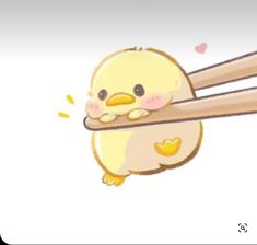 a cute little bird holding on to some chopsticks