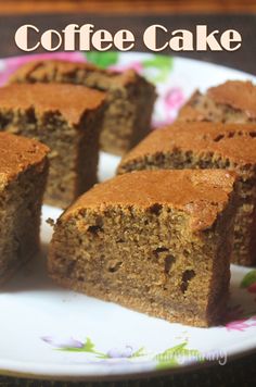 several pieces of cake on a plate with the words coffee cake in front of it